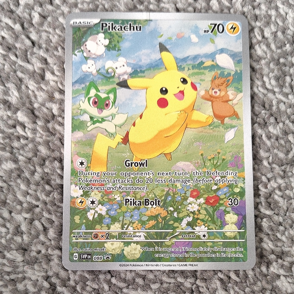 Set of 4 Pokemon Cards And A Pokemon Coin